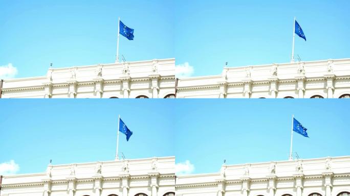哥德堡市中心古斯塔夫阿道夫广场市政厅大楼顶上的欧盟旗帜迎风飘扬