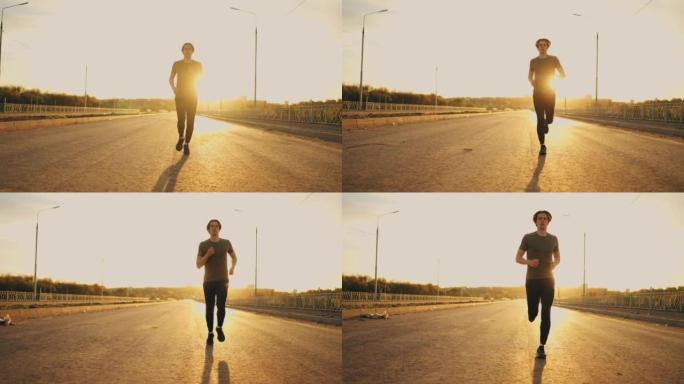 英俊的运动员在夏天的早晨在空旷的道路上独自奔跑，男性形象