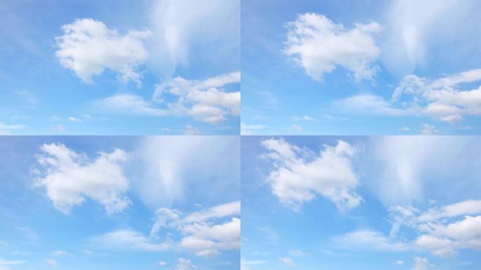 美丽的白片云在蓝天下慢慢变化。