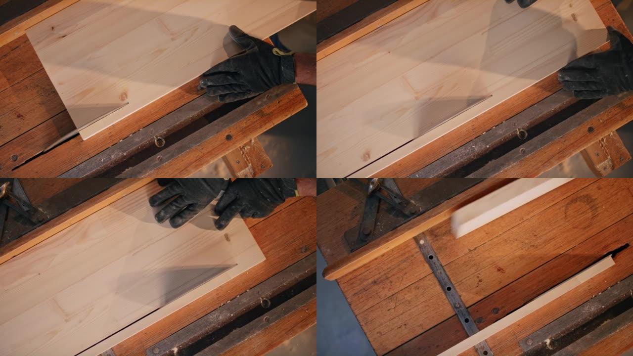 LD木板被推向台锯并切割