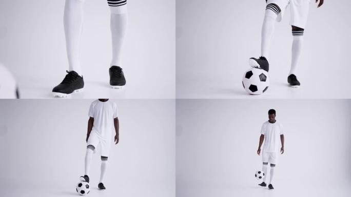 年轻的非洲裔美国足球运动员正在演播室里玩球，脚的特写镜头和全长