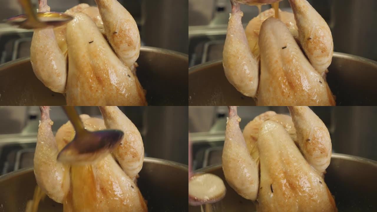 厨师在大锅中准备一只小鸡的详细照片