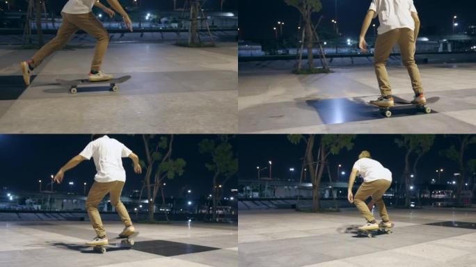播放过程中拍摄幕后视频。亚洲青年男子在夜城溜冰场滑板