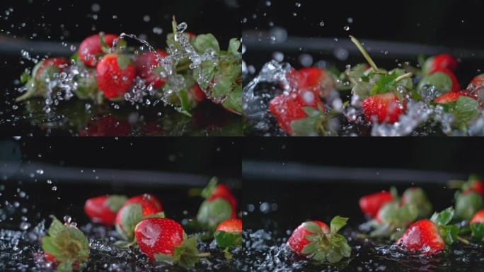 SLO MO草莓落在潮湿的表面上并在上面滚动