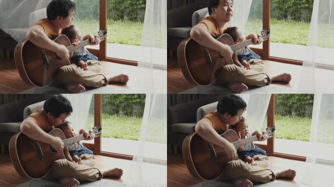 父亲在家教儿子弹吉他