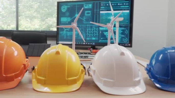 彩色建筑头盔和风车显示屏背景的未来现实技术。