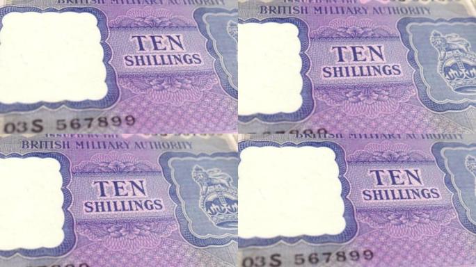 英国英镑纸币-10先令纸币细节与皇冠全息图-英语10先令纸币-新聚合物10先令内部特写镜头 & 旧1