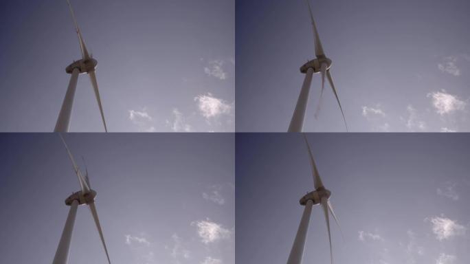 大风车对着蓝天的细节镜头