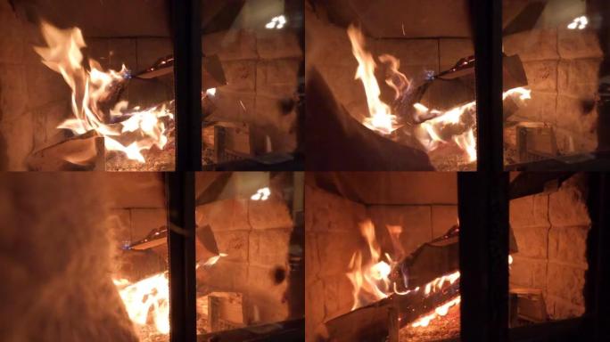 舒适壁炉的详细视图，添加日志并帮助其燃烧