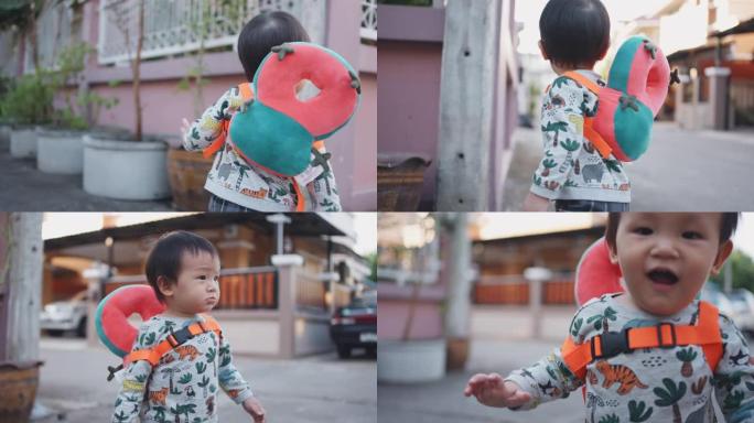 亚洲可爱男婴在户外散步和玩耍