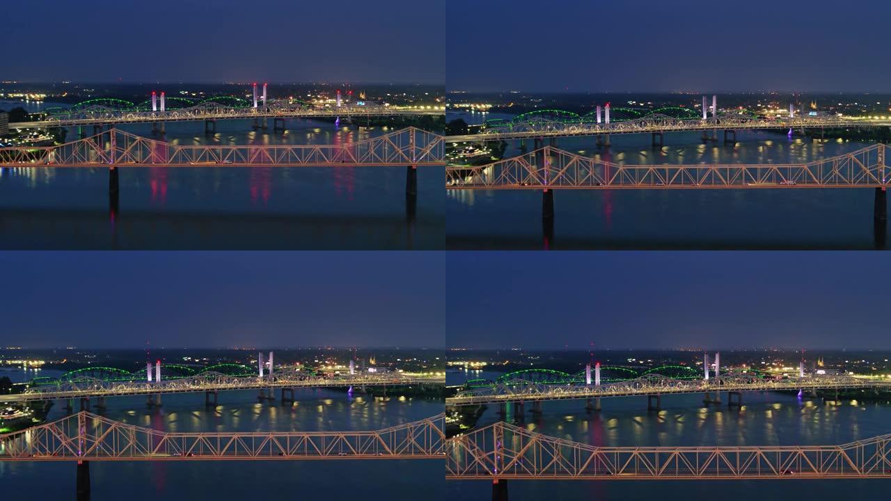 俄亥俄州通往路易斯维尔的河桥在晚上点亮