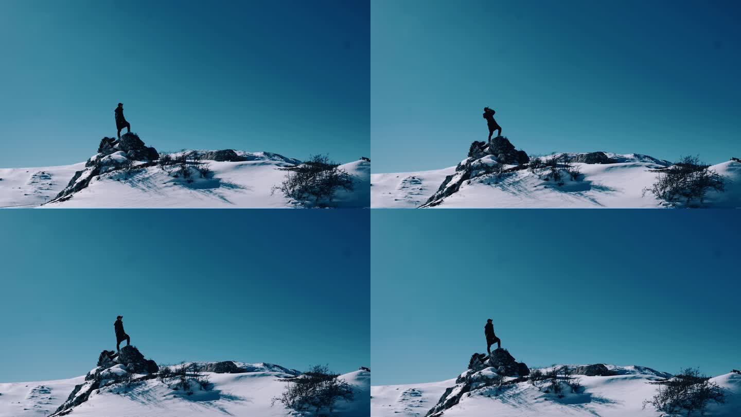 【4K】男子站在雪山顶上