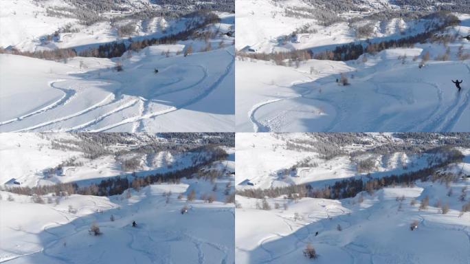 单板滑雪降落在雪山上的空中无人机拍摄