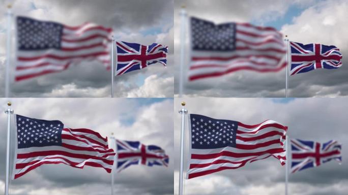 在多云的天空下，美利坚合众国和英格兰的旗帜