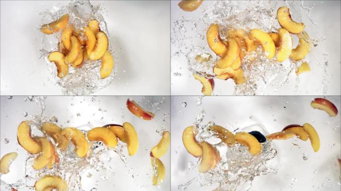 爆炸桃子和爆裂水和切片的超慢动作