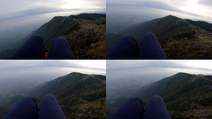滑翔伞时的山景，腿可见