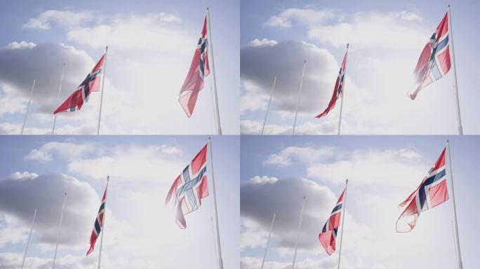 挪威国旗和天空白云飘扬旗帜