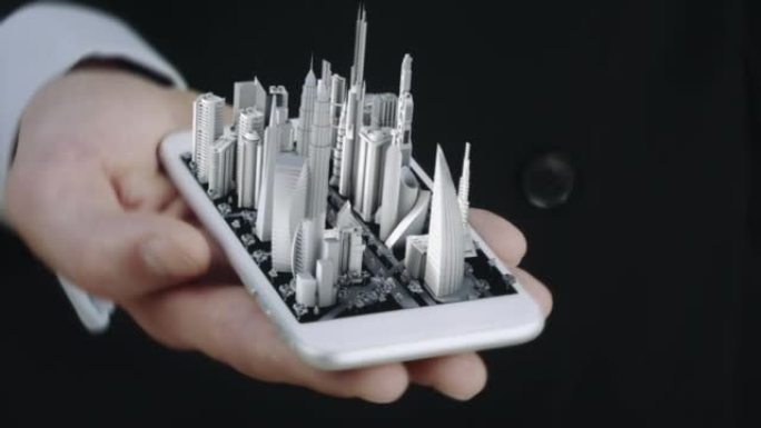 商人拿着手机3D城市模型