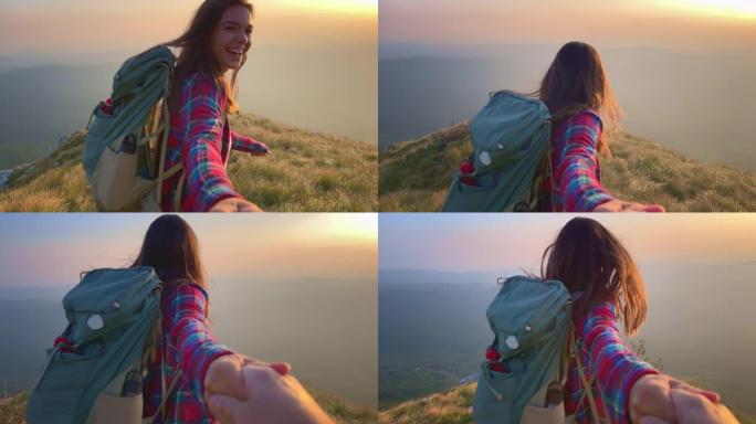 SLO MO POV女徒步旅行者带领男友从山顶看日落
