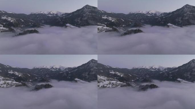 空中无人机在日出前拍摄了山脉附近的云海