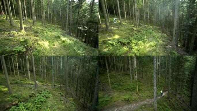 空中无人机拍摄了三名山地车手穿过树林