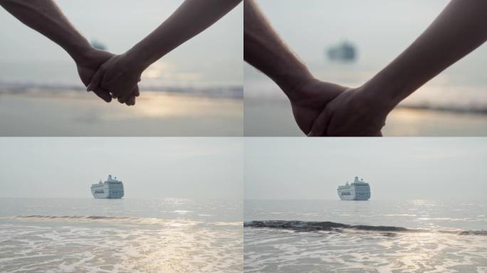 恋爱中的情侣在海滩上散步。携手对抗蓝天与大船