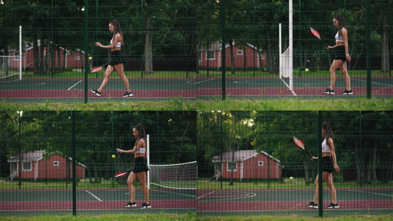 黑发网球运动员正在球场上散步，弹跳球，穿着短裙的苗条运动女人