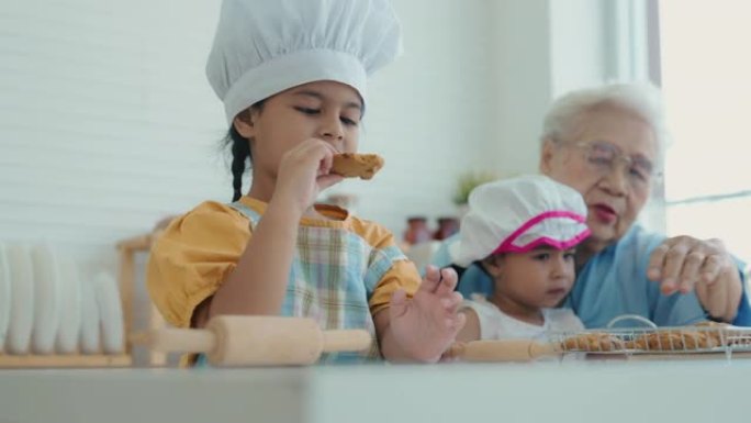 奶奶带着两个小孩，女孩在家准备一起做面包的配料