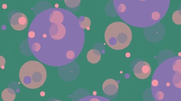抽象的绿色背景，粉红色和紫色的球体向不同方向缓慢移动