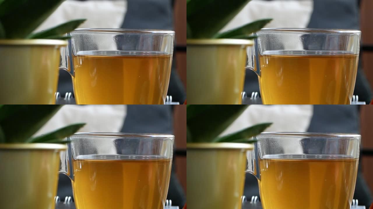 茶碟上热茶的特写镜头，慢动作。
