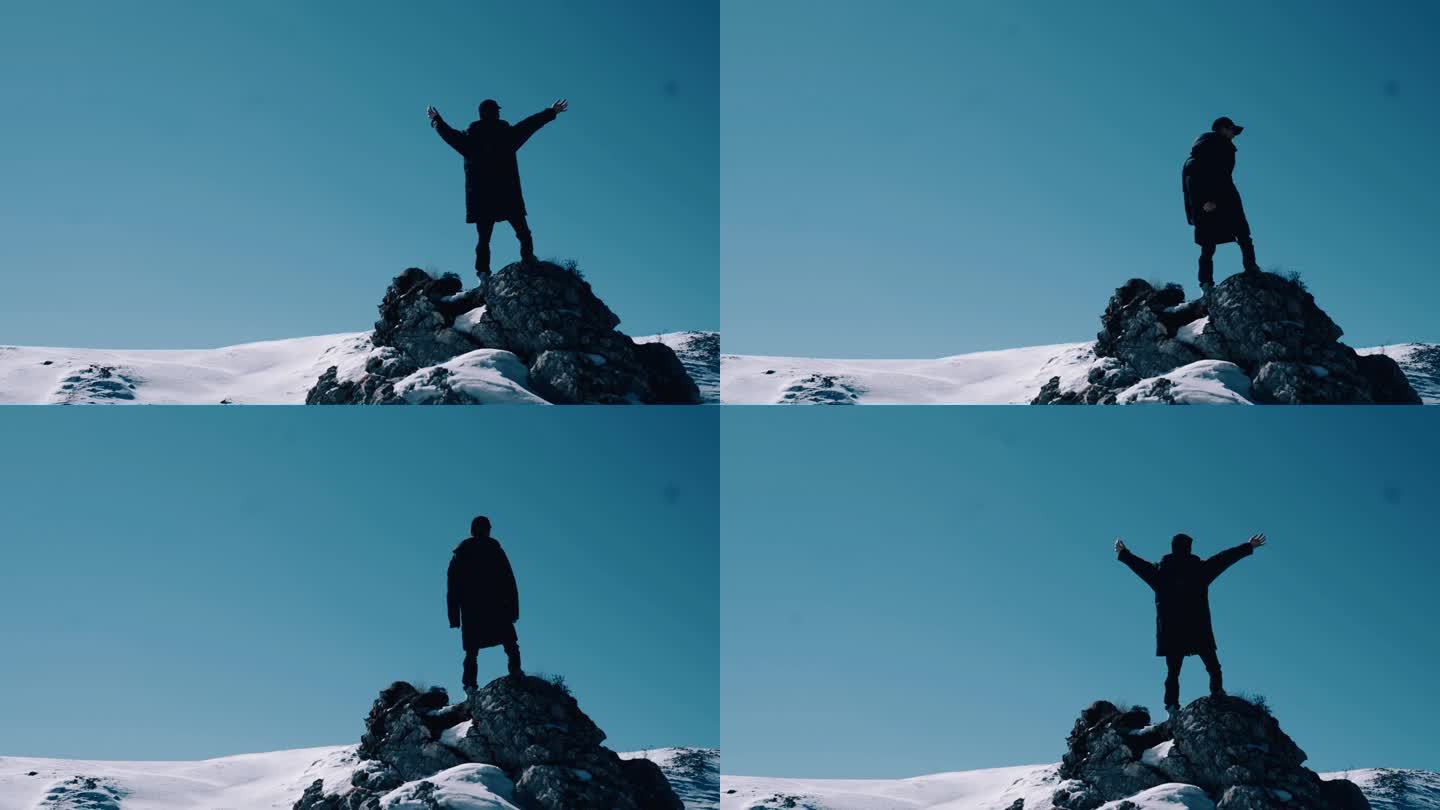 【4K】男子站在雪山顶上