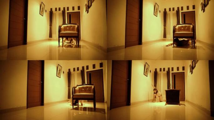 亚洲妇女在黄色房间内用椅子跳舞