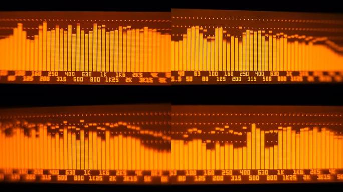 专业音乐会均衡器显示屏上有黄色频谱分析仪