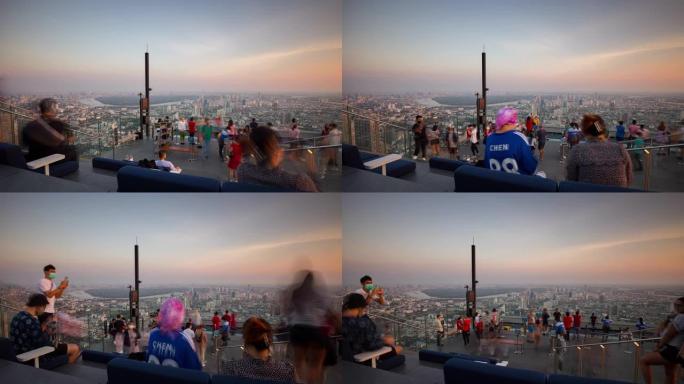日落天空曼谷市著名摩天大楼拥挤的顶部视点全景4k延时泰国