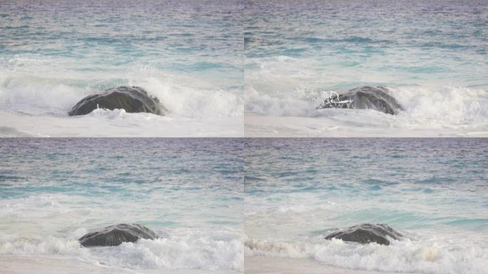海浪在海滩上坠落的细节镜头