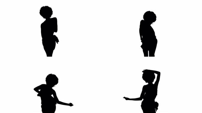 一个非洲发型跳舞的女人的后视，感官上移动了她的身体和手。战利品风格的舞蹈。孤立，黑白，剪影