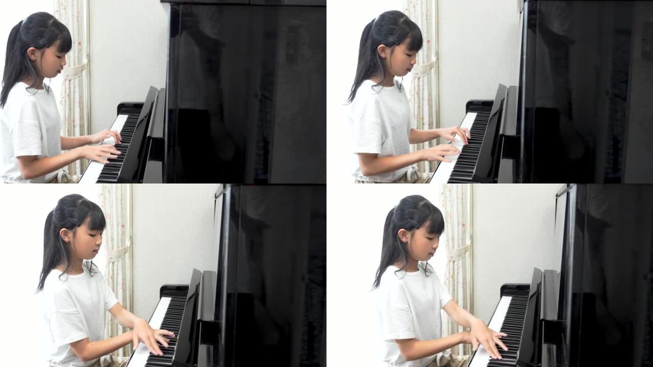 日本女孩弹奏立式钢琴