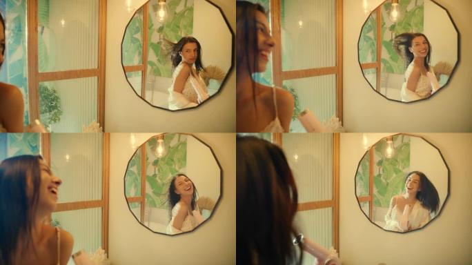 感觉棒极了。Wman享受早上的浴室活动，在镜子前玩得开心。干燥头发和跳舞