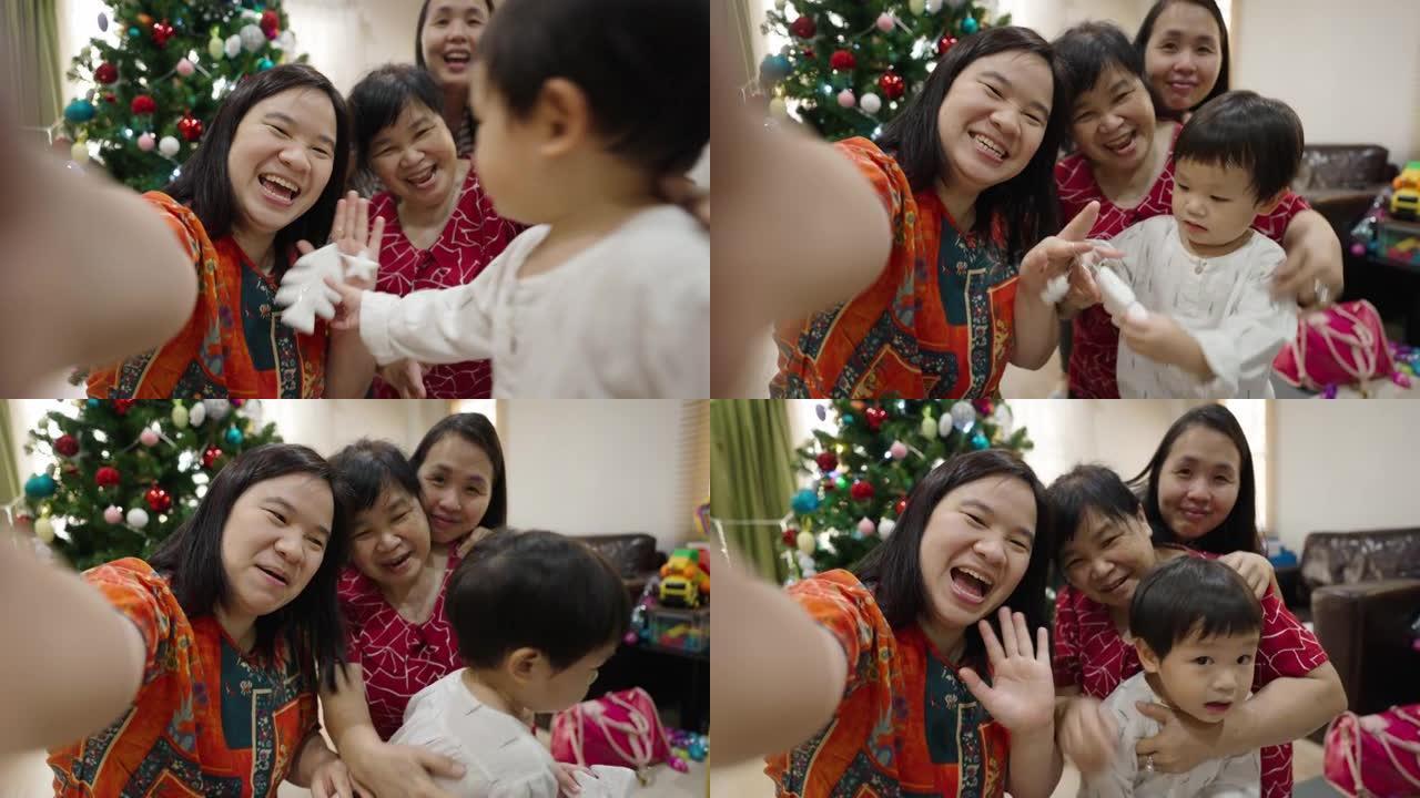 多世代家庭在圣诞节活动中一起拍摄视频。