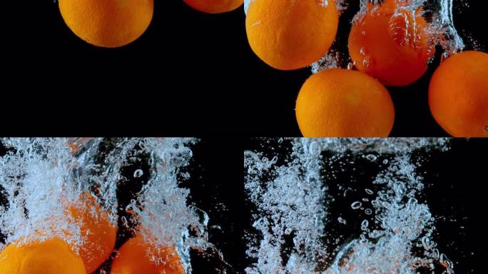 SLO MO LD整个橘子掉入水中并产生气泡
