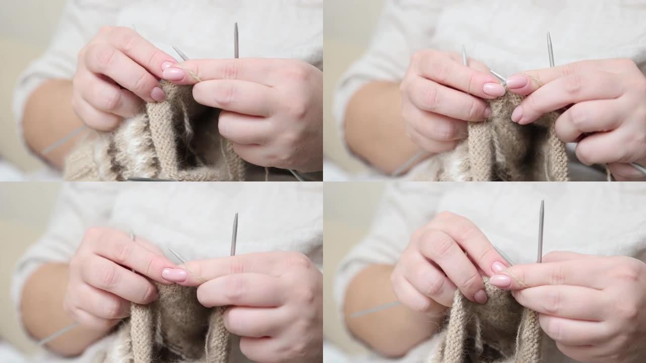 用织针用羊毛手工编织。用狗毛纱线制作袜子。