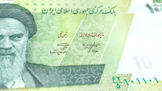 伊朗伊朗里亚尔100000钞票，十万伊朗里亚尔，伊朗里亚尔的特写和宏观视图，跟踪和多利镜头10000