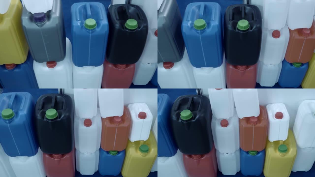 一排排不同的新塑料罐不同的颜色、形状和尺寸