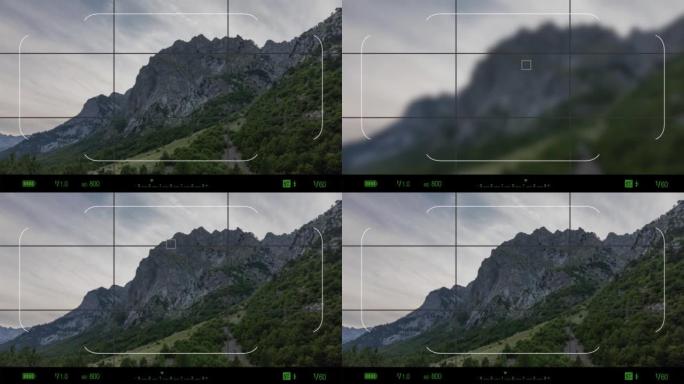 在Prokletije国家公园的被诅咒的山脉上通过照相机观看