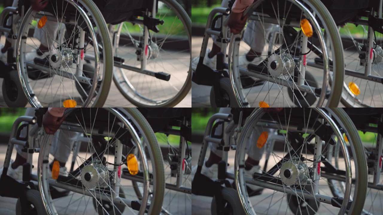 残疾人使用手动轮椅、移动辅助装置的特写镜头
