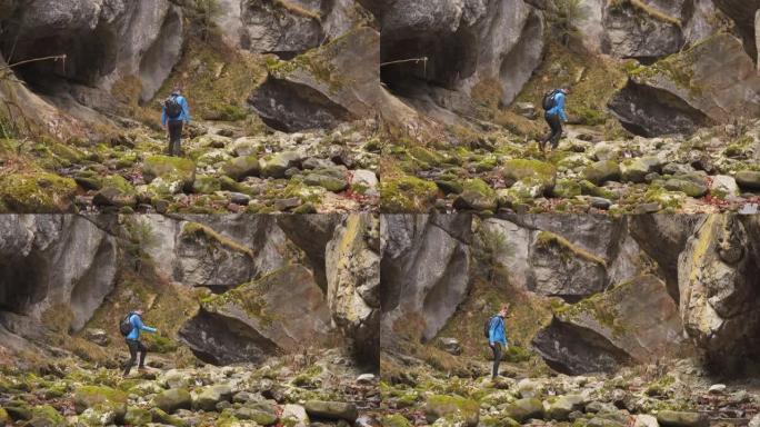 年轻人徒步旅行岩石峡谷