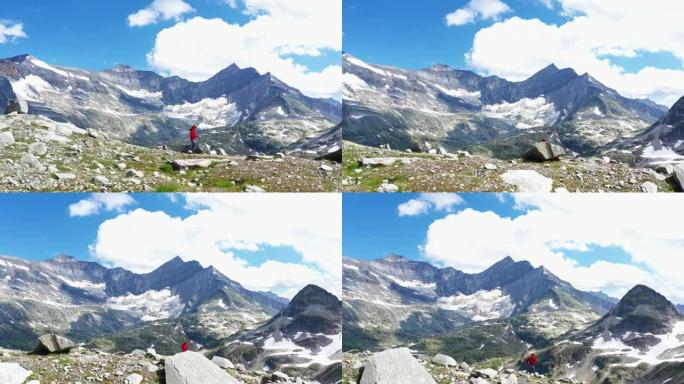 山地慢跑过度失误。沿着雪山小径奔跑的女人。鸟瞰图