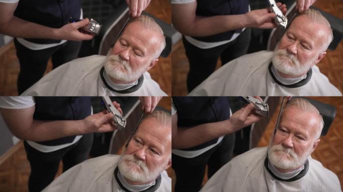 在一家现代化的理发店里，专业的男发型师用剃刀和梳子为年长的顾客理发和造型