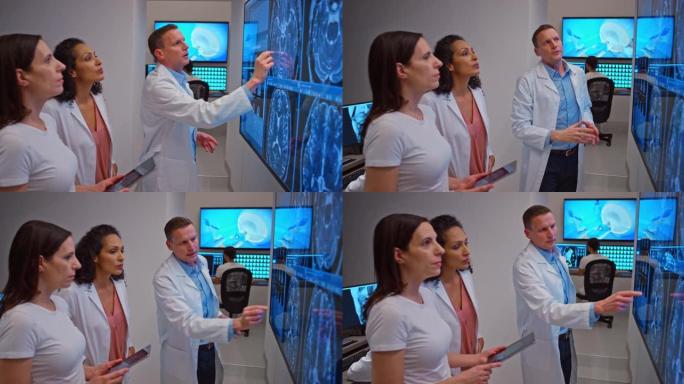 三位放射科医生在灯箱上分析头部MRI图像