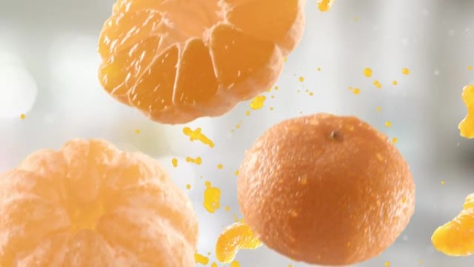 橘子的切片落在厨房背景上